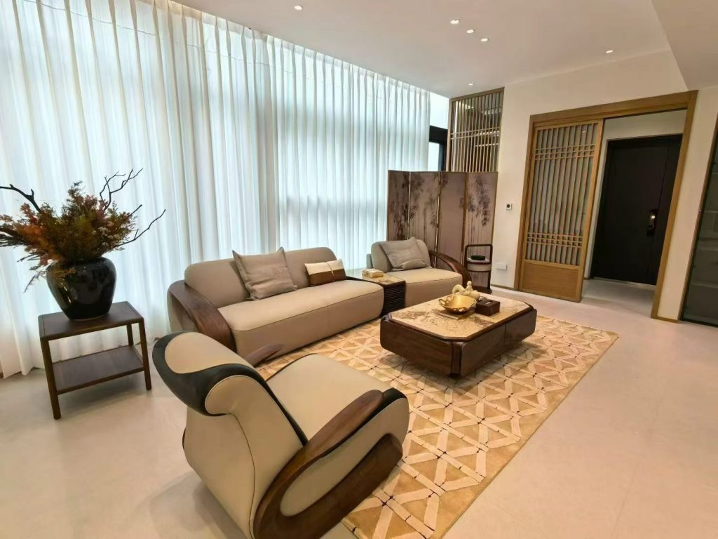 Warm Walnut Residence living room — custom black walnut and cream leather sofa suite with marble-top coffee table