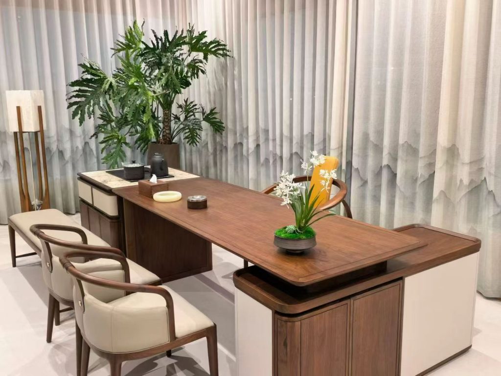 Bespoke black walnut tea room with L-shaped tea desk, built-in tea station and cream leather chairs